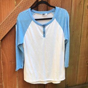 Baseball style shirt.